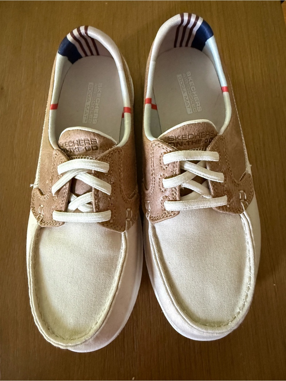 Skechers Women’s Casual Canvas Boat Shoe in White and Brown